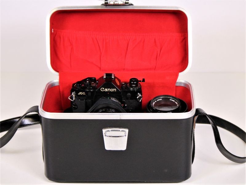 Vintage Canon A1 met 3 lenzen en koffer